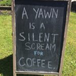 Yawn is a silent scream for coffee sign